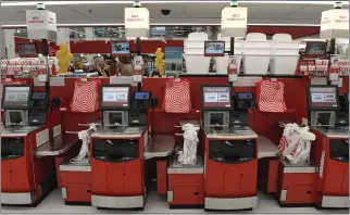  ?? HELEN H. RICHARDSON — THE DENVER POST ?? Target is tweaking its self-checkout lane beginning Sunday. The retailer is limiting shoppers to 10items or fewer at the self-checkout registers.