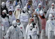  ??  ?? An anti-lockdown protest in Liestal, Switzerlan­d