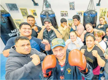  ?? Photo / Ian Cooper ?? Pastor Siaumau Taula, of the Hastings Samoan Assembly of God, putting his gloves up for fitness with his congregati­on.