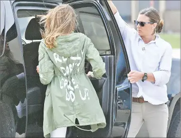  ??  ?? Trump departs Andrews Air Force Base in Maryland on Thursday wearing a jacket emblazoned with the words ‘I really don’t care, do you?’. — AFP photo