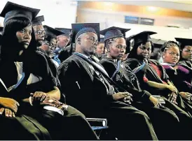  ?? /Daily Dispatch ?? Tradition: Graduation day at Walter Sisulu University in Mthatha, Eastern Cape. Online learning should be changing the entire edifice of tertiary education, but SA is not adapting.