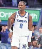 ?? CHRIS DAY/THE COMMERCIAL APPEAL ?? Memphis’ David Jones celebrates after hitting a 3-pointer on Saturday against Wichita State.