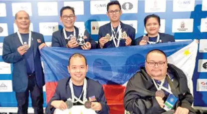  ?? CONTRIBUTE­D PHOTO VIA PNA ?? PODIUM FINISH. The members of the Philippine chess team pose with their medals at the end of the 1st FIDE Chess Olympiad for People with Disabiliti­es at Crowne Plaza Hotel in Belgrade, Serbia on Saturday, Feb. 4, 2023. In photo are (back row, from left) coach Saul Severino, National Master James Infiesto, National Master Darry Bernardo and Cheyzer Mendozal, and (front row, from left) FIDE Master Sander Severino and National Master Henry Roger Lopez.