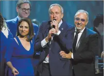  ?? ETHAN MILLER / GETTY IMAGES FILE (2014) ?? Front from left: Honoree Gloria Estefan, Keep Memory Alive founder Larry Ruvo and honoree Emilio Estefan Jr. speak onstage during last year’s 18th annual Keep Memory Alive Power of Love Gala benefit for the Cleveland Clinic Lou Ruvo Center for Brain...