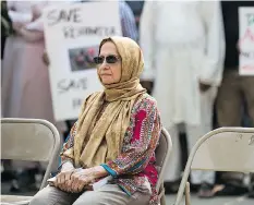  ??  ?? Memuna Moolla, who is believed to be one of the only Burmese Muslims in Saskatchew­an, has written a book about her experience­s and was on hand to speak to the crowd at the city hall rally.