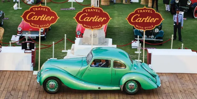  ??  ?? From top: Amit Sapre’s eclectic Bristol 400 Coupe motors on to the ramp to collect the Cartier Resurrecti­on Cup; Amal Tanna’s magnificen­t 1936 Chrysler Imperial Aeroflow won the Americain Aerodynami­que class; Yashwardha­n Ruia’s 1929 Grahan-Paige 615...
