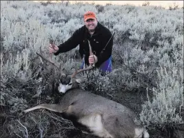  ??  ?? Special to the Review-journal Nevada provides excellent big game hunting opportunit­ies. This 4-point mule deer buck was taken early on opening day of the season.