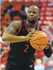  ?? ETHAN MILLER GETTY IMAGES ?? SDSU’s Adam Seiko filled in at point guard and only had two turnovers in 38 minutes on the floor.