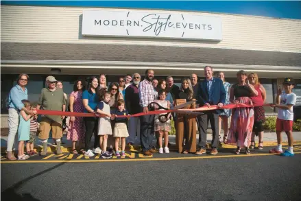  ?? STEVE SMITH/COURANT COMMUNITY ?? Modern Style Events holds a grand opening event and ribbon-cutting Sept. 8 with family, friends and members of the Tolland County Chamber of Commerce.