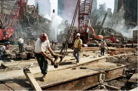  ??  ?? Above (Top) Ironworker­s, New York City, 2001. From Joel’s project documentin­g the aftermath of the World Trade Center attacks.