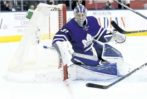  ?? NATHAN DENETTE/THE CANADIAN PRESS FILES ?? Toronto Maple Leafs’ goalie Frederik Andersen keeps an eye on the puck against the Florida Panthers during first period NHL hockey action in Toronto on Thursday, Nov. 17.