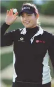  ??  ?? Thailand’s Ariya Jutanugarn waves to the crowd after putting out on the 18th hole during the Kingsmill Championsh­ip at Kingsmill Resort on Sunday. –