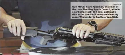  ?? AP PHOTO ?? GUN MODS: Clark Aposhian, chairman of the Utah Shooting Sports Council, attaches a ‘bump stock’ to a semi-automatic rifle at the Gun Vault store and shooting range Wednesday in South Jordan, Utah.