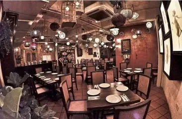  ??  ?? Dimly-lit and quiet, Wau Dining is worlds away from the busy hustle and bustle of Changkat Bukit Bintang.