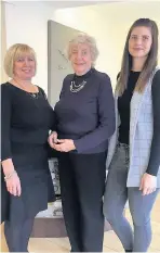  ??  ?? Pictured, centre, is Rena Olding with hairdresse­rs Lynn Sharatt (left) and Amy Hale (right).