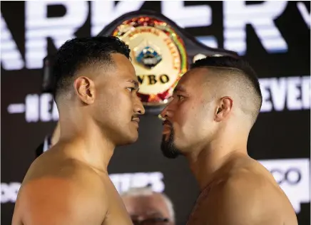  ?? Photo / Photosport ?? Joseph Parker (right) insisted he didn’t hear what Junior Fa said due to the noise and “because I was focused on being intense”.