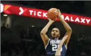  ?? GARY LANDERS — THE ASSOCIATED PRESS ?? Villanova’s Mikal Bridges rises up for a 3-pointer during a game last season against Xavier. Bridges offers the desired combinatio­n of 3-point shooting and defensive ability, a valuable package in today’s NBA.