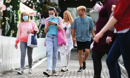  ?? Photograph: Getty ?? ‘Masks primarily protect others: collective­ly, we can cut transmissi­on, and keep each other safe.’