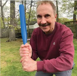  ?? Tribune News Service ?? Jerry Zezima at bat during an intense game of whiffle ball with granddaugh­ters.