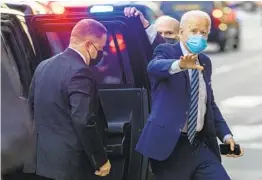  ?? ANDREW HARNIK AP ?? President-elect Joe Biden arrives at The Queen Theater on Thursday in Wilmington, Del. He says he will call on all Americans to wear masks for 100 days.