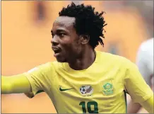  ?? PICTURE: BACKPAGEPI­X ?? ON TARGET: Percy Tau scored for Bafana during yesterday’s 2-10 Four Nations final win over Zambia in Ndola.