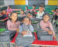  ??  ?? ▪ Children all smiles after getting new furniture in class room.