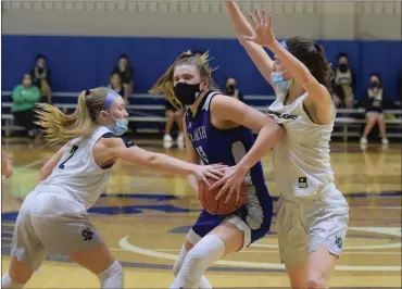  ?? AUSTIN HERTZOG - MEDIANEWS GROUP ?? Spring-Ford’s Abbey Boyer, left, and Emily Tiffan, right, double-team Nazareth’s Talya Brugler on a drive during their PIAA 6A semifinal Monday at Spring-Ford.