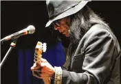  ?? EVAN AGOSTINI / INVISION 2013 ?? Sixto Rodriguez, who became the subject of the Oscarwinni­ng documentar­y”Searching for Sugarman” has died, according to the Sugarman.org website on Tuesday and confirmed Wednesday by his granddaugh­ter. He was 81.