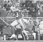  ?? KYLE TERADA/USA TODAY SPORTS ?? The 49ers’ Christian Mccaffrey runs for a touchdown during the fourth quarter of Saturday’s game against the Packers.