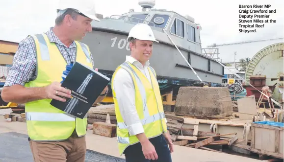  ?? ?? Barron River MP Craig Crawford and Deputy Premier Steven Miles at the Tropical Reef Shipyard.