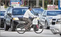  ?? LANNIS WATERS / THE PALM BEACH POST 2016 ?? West Palm officials don’t consider the downtown overly congested, but with developmen­t projects in the pipeline, see a need to give people alternativ­es to driving.