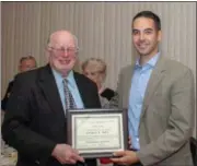  ?? PHOTO COURTESY ONEIDA COUNTY HISTORY CENTER ?? Volunteer of the Year George Abel, left, and OCHC President Andy Weimer.