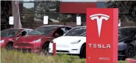  ?? AFP-Yonhap ?? Tesla cars sit parked in a lot at a Tesla service facility in Fremont, California, Wednesday.