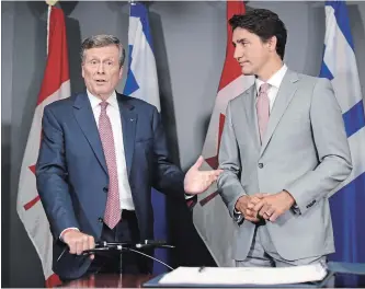  ?? RICHARD LAUTENS TORONTO STAR ?? Mayor John Tory told Prime Minister Justin Trudeau that combating gun violence requires investment­s in community supports for youth and families and neighbourh­oods, and not in policing alone.