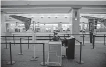  ??  ?? TSA checkpoint at John Wayne Airport is near empty on March 24 in Santa Ana, Calif. Since the coronaviru­s pandemic bagn, the U.S. Department of Transporta­tion received 21,914 complaints about airline service, up 1,509.9% from the previous May,only 999 were not about airline refunds. [JAY L. CLENDENIN/LOS ANGELES TIMES/ TNS]