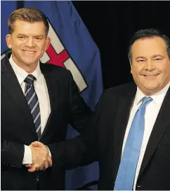  ?? DAVID BLOOM / POSTMEDIA NEWS ?? Wildrose Party Leader Brian Jean and Alberta PC Leader Jason Kenney announce the merger Thursday.