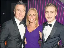  ??  ?? TALENT: Bradley Walsh with his gold disc for selling more than 100,000 copies of Chasing Dreams. Left, with wife Donna and son Barney. Inset top, on quiz The Chase
