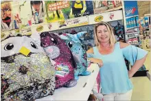  ?? BRENT DAVIS WATERLOO REGION RECORD ?? Toys “R” Us Canada president and chief executive officer Melanie Teed-Murch visits the Kitchener store on Monday. Her career with the chain began 22 years ago as manager at the Kitchener location.