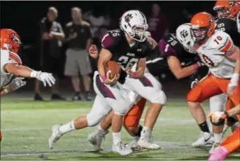  ?? PETE BANNAN — DIGITAL FIRST MEDIA ?? Garnet Valley running back Matt Lassik carries the ball against Marple Newtown this season. Lassik and Danny Guy have created a formidable backfield pairing that the Jaguars have ridden to a second straight District 1 Class 6A final. They hope to take...