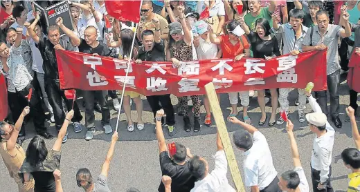  ?? AFP ?? En el exilio. Protestas en Japón por las libertades en China. También ocurren en otros lugares del sudeste asiático.