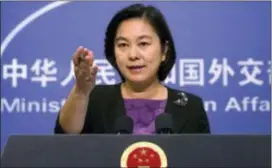  ?? ASSOCIATED PRESS FILE PHOTO ?? Chinese foreign ministry spokeswoma­n Hua Chunying gestures during a Sept. 15 press briefing at the Ministry of Foreign Affairs building in Beijing. China on Friday denied violating U.N.-imposed limits on oil supplies to North Korea after U.S. President...