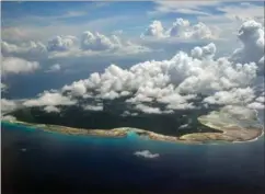  ?? FOTO: AP ?? North Sentinel Island tilhører den indiske øgruppe Andamanern­e og er helt daekket af regnskov.