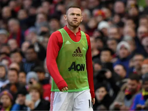  ?? (Getty) ?? Rooney has endured a tough season under Jose Mourinho