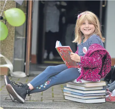  ?? Picture: George McLuskie. ?? Seven-year-old Jessica Lindow was there to see the library reopened.