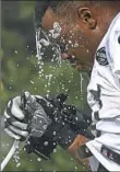  ?? Peter Diana/Post-Gazette ?? CHILLIN’ OUT
Marcus Gilbert cools off during the Steelers’ practice Saturday at Saint Vincent College.