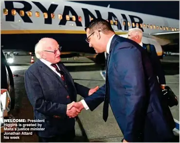  ?? ?? WeLcome: President Higgins is greeted by Malta’s justice minister Jonathan Attard his week