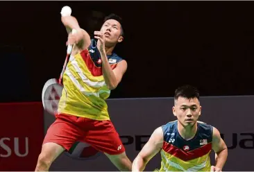  ??  ?? In the fray: doubles players Goh V Shem (left) and Tan Wee Kiong, and singles player Liew daren (left pic) are among eight independen­t shuttlers named in the Thomas Cup training squad.