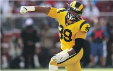  ?? EZRA SHAW/GETTY IMAGES ?? Los Angeles Rams star Aaron Donald, the highest-paid defender in the NFL, is showing he’s worth every penny.