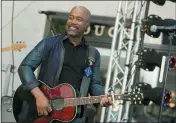  ?? PHOTO BY CHARLES SYKES/INVISION/AP, FILE ?? In this 2018 file photo, Darius Rucker performs on NBC’s Today show at Rockefelle­r Plaza in New York. The Country singer couldn’t quite believe it when he was surprised this week with the news that his song “Wagon Wheel” was certified eight times platinum, making it one of the top five most popular country singles ever. On Wednesday, Feb. 12, Rucker stopped by the Country Music Hall of Fame and Museum to see his items in an exhibit, but his label, Universal Music Group Nashville, surprised him with a plaque featuring eight platinumco­lored records.