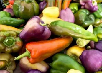  ?? Paul J. Richards/AFP/Getty Images ?? Fresh peppers are seen for sale on July 27, 2017, during a weekly street food fair in Washington, D.C.